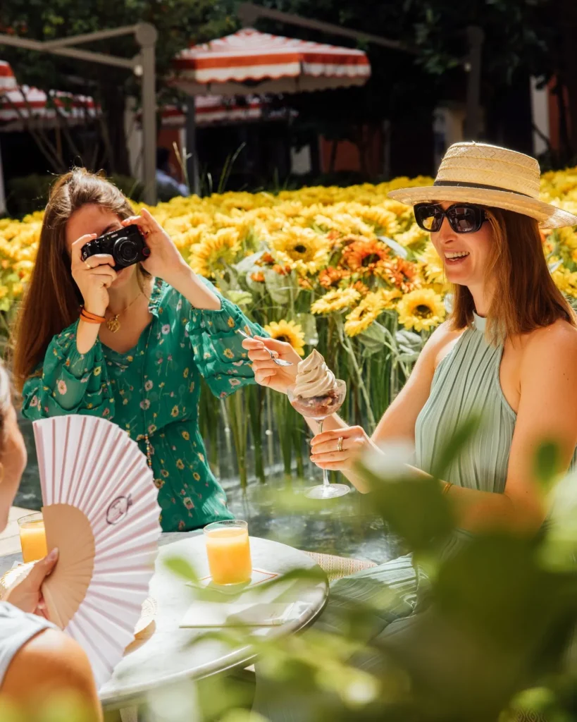 Outdoor dining scene at Le Royal Monceau Paris