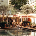 Outdoor terrace and dining area at Le Royal Monceau Paris