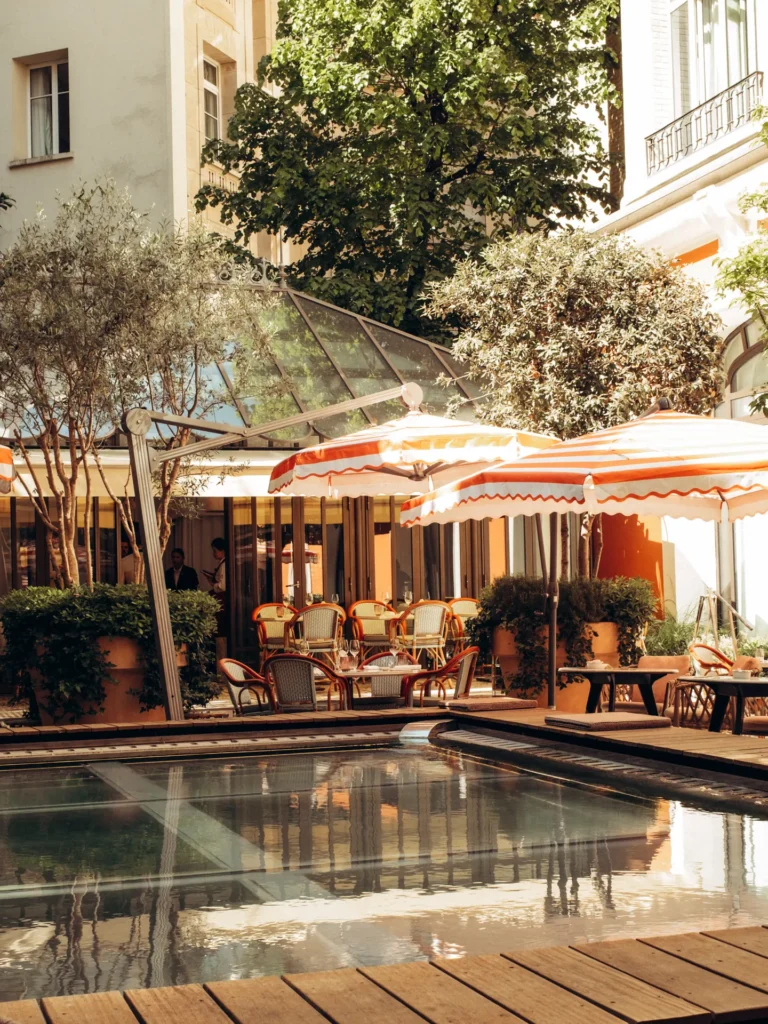 Outdoor terrace and dining area at Le Royal Monceau Paris