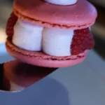 Pink macaron dessert associated with Le Tremplin Courchevel