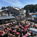 Busy outdoor dining terrace at Le Tremplin Courchevel in Courchevel