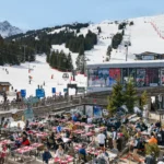 Le Tremplin Courchevel outdoor terrace filled with diners in the ski resort