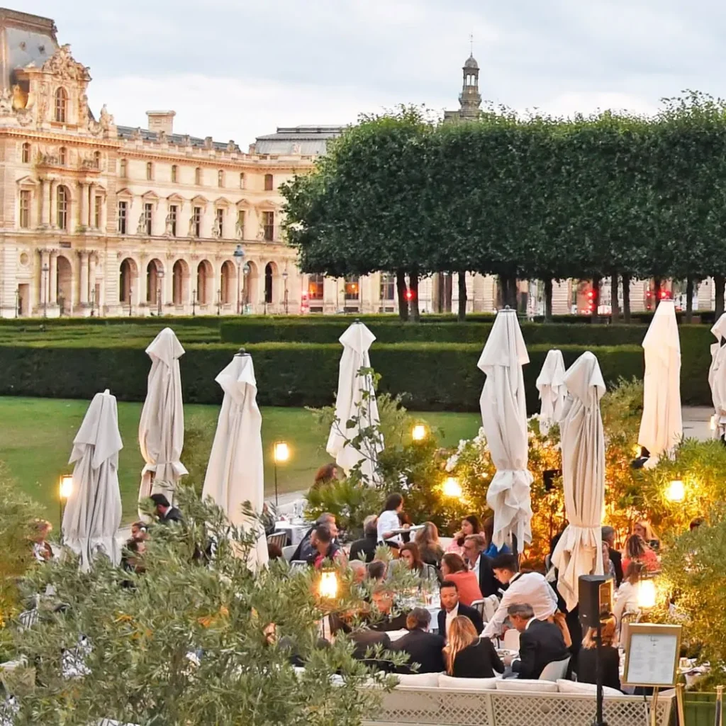 Loulou Paris terrace with views toward the Louvre gardens