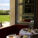 Table set for dining on the terrace at Loulou Paris