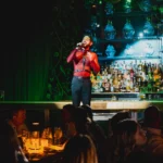 Live performance beside the bar at Maison Milano