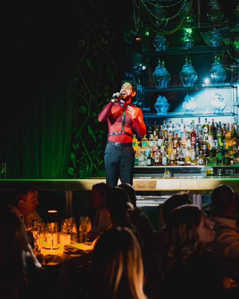 Live performance beside the bar at Maison Milano