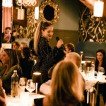 Guests enjoying dinner and drinks at Maison Milano