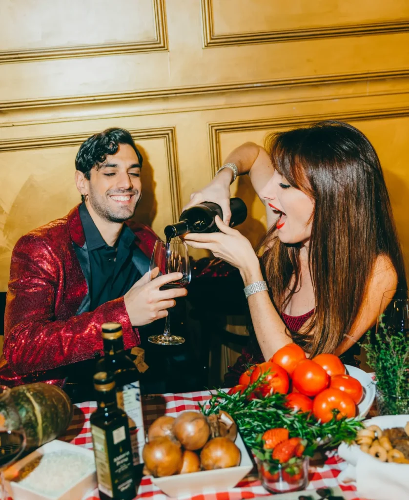 Guests enjoying food and drinks together at Maison Milano
