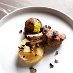 Gourmet plated dish served at Maison Milano