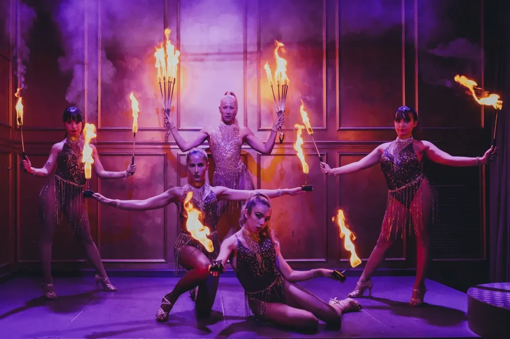Dancers performing during a live show at Maison Milano