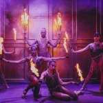 Dancers performing during a live show at Maison Milano