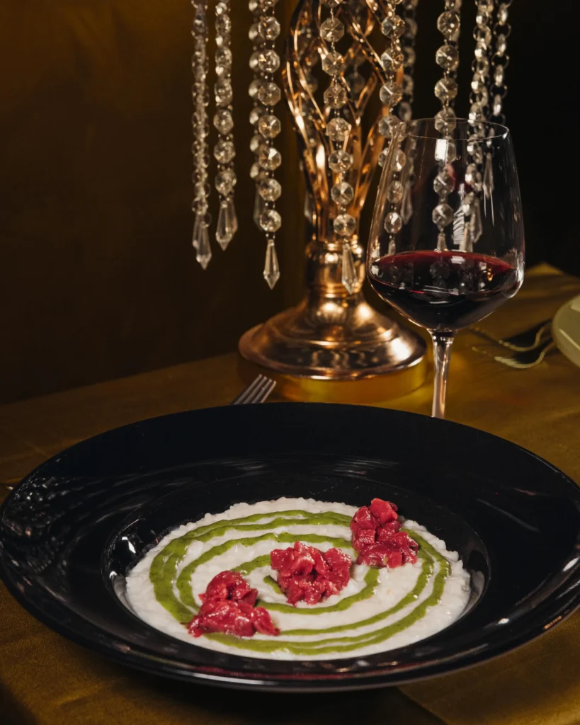 Artfully plated dish served at Maison Milano