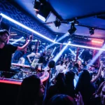 DJ performing to a crowd inside Matignon Paris