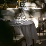 White tablecloth dining area outside Matignon Paris