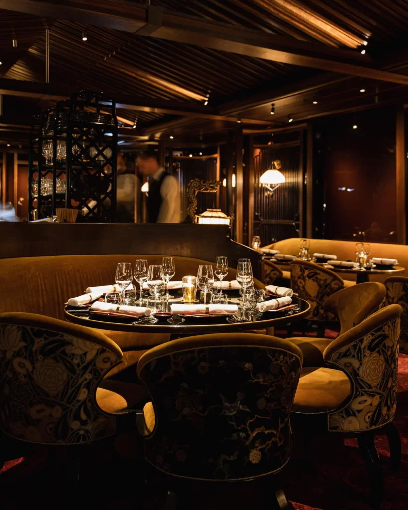 Elegant dark-toned dining room at MUN Paris