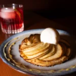 Dessert served with a cocktail at Pachamama Paris