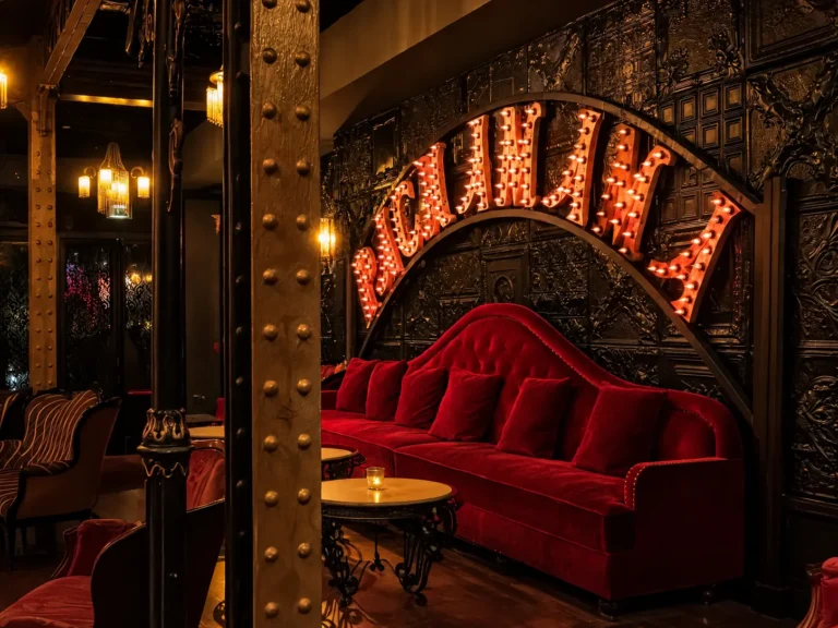 Red velvet lounge seating inside Pachamama Paris