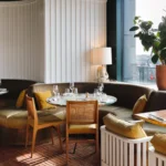 Elegant lounge seating inside Perruche Paris