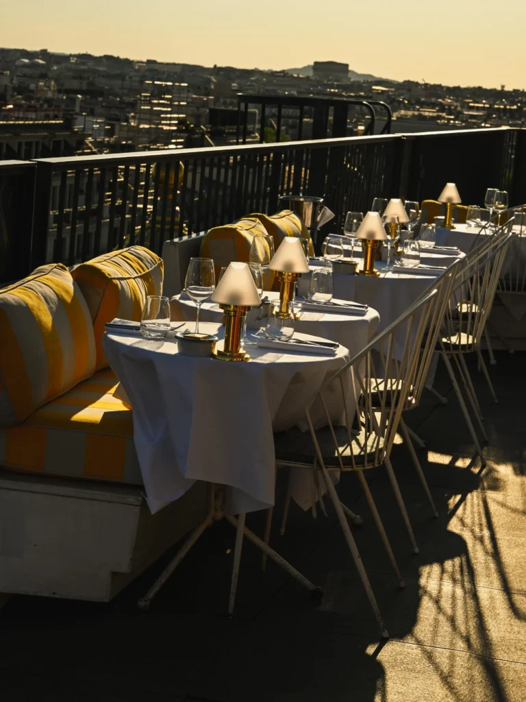 Perruche Paris rooftop terrace overlooking Paris at sunset