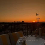 Perruche Paris terrace overlooking Paris during sunset