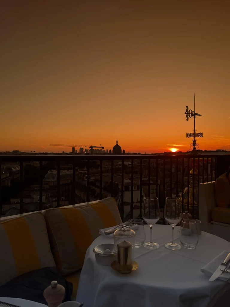 Perruche Paris terrace overlooking Paris during sunset
