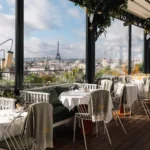 Outdoor dining terrace at Perruche Paris overlooking the city
