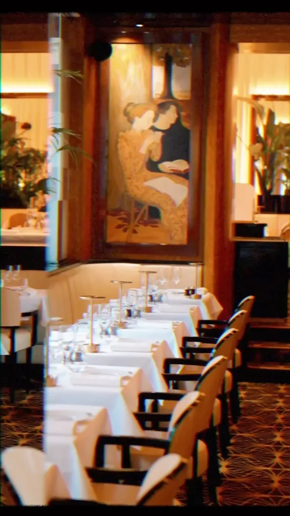 Elegant dining room inside Plaza Athenee in Paris