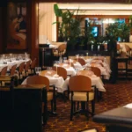 Elegant restaurant dining area at Plaza Athenee in Paris