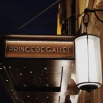 Prince de Galles Paris entrance sign illuminated at night