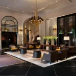 Grand hotel lobby with elegant seating at the Prince de Galles Paris
