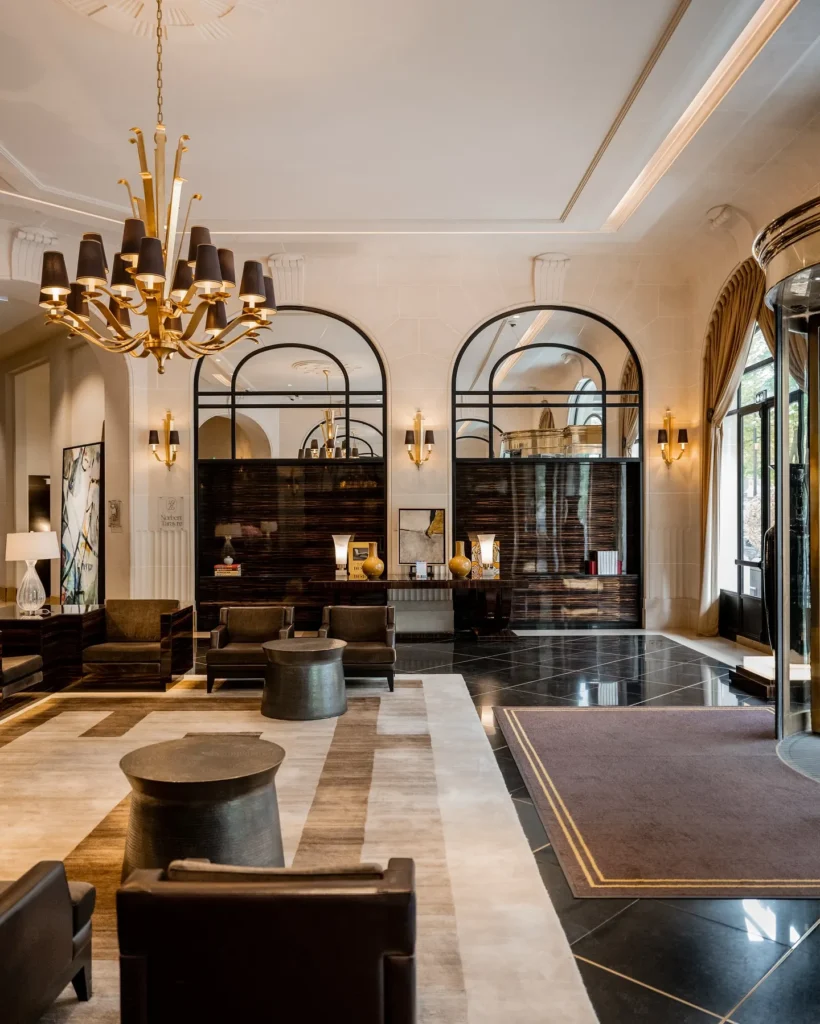 Elegant hotel lobby with chandeliers at the Prince de Galles Paris