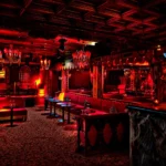 Red-lit nightclub interior at Raspoutine Paris