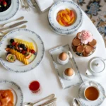 Breakfast spread served on an elegant table at the Ritz Paris