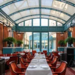 Glass-roofed dining terrace at the Ritz Paris