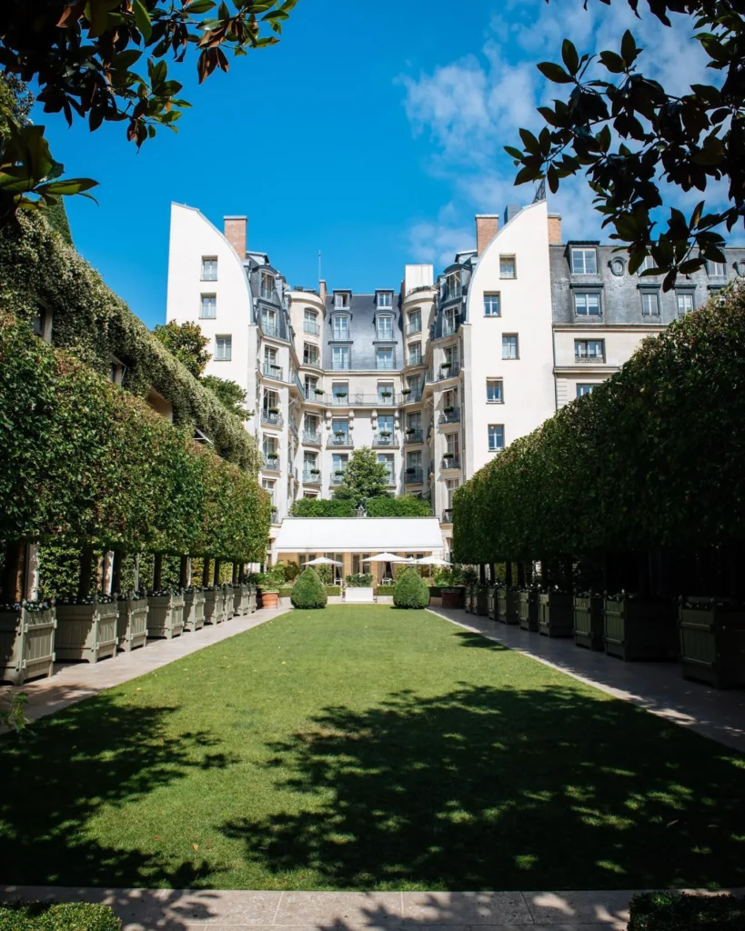 Formal garden and hotel exterior at the Ritz Paris