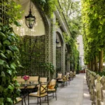 Lush garden terrace with outdoor seating at the Ritz Paris