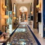Classic hotel corridor with ornate decor at the Ritz Paris