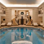 Luxury indoor pool surrounded by classic interiors at the Ritz Paris