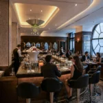 Elegant dining room and bar area at Scott's Mayfair