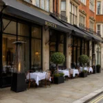 Scott's Mayfair restaurant exterior with outdoor dining tables in London