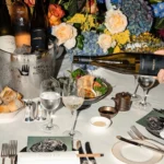 Elegant table setting with flowers and wine at Scott's Mayfair