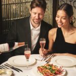 Guests enjoying a fine dining experience at Scott's Mayfair in London