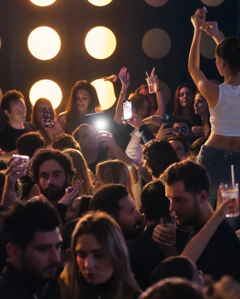 Guests dancing under the lights at Silencio Club Paris