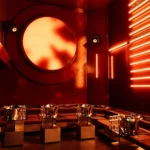 Red-lit lounge interior at Silencio Club Paris