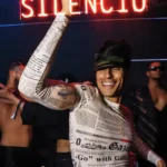 Guest holding a bottle during a night at Silencio Club Paris