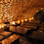 Stone-vaulted lounge interior at Silencio Club Paris