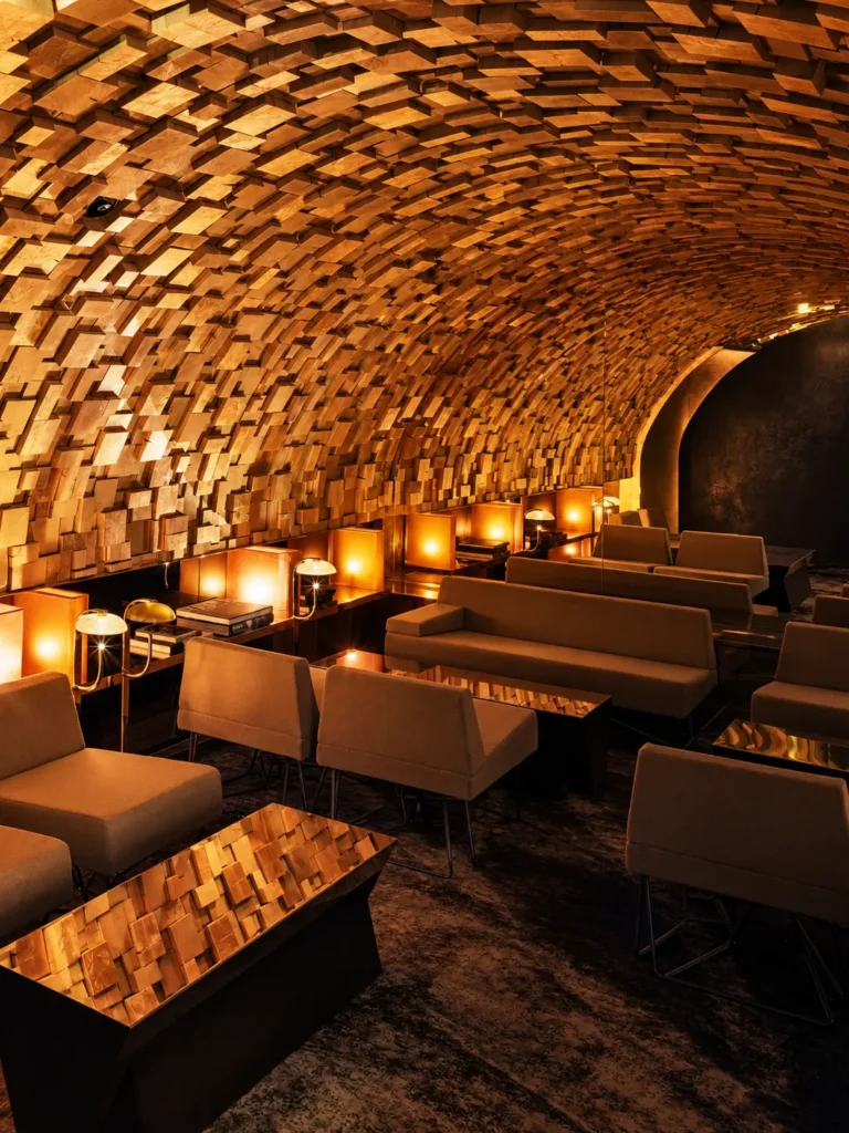 Stone-vaulted lounge interior at Silencio Club Paris
