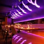 Purple-lit dining interior at STK Milan
