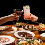 Selection of dishes and cocktails served at STK Milan