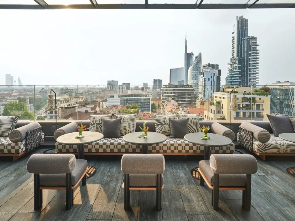 Outdoor terrace at STK Milan overlooking the Milan skyline